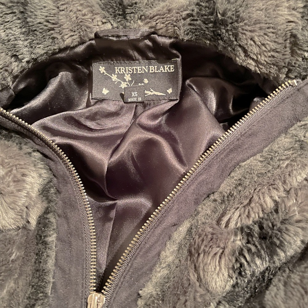 Dark brown faux fur jacket perfect to wear with anything. Super cute